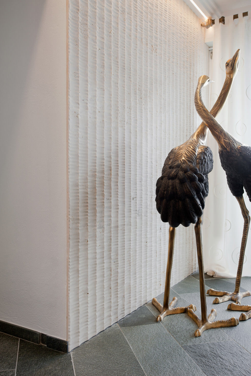 Wandgestaltung als Kunst – graviert oder hinterleuchtet