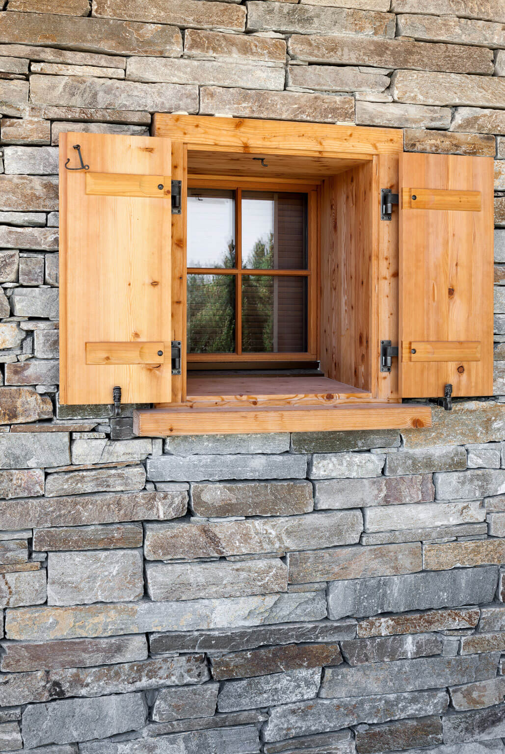 Fassadenverkleidung in Naturstein für ein Chalet